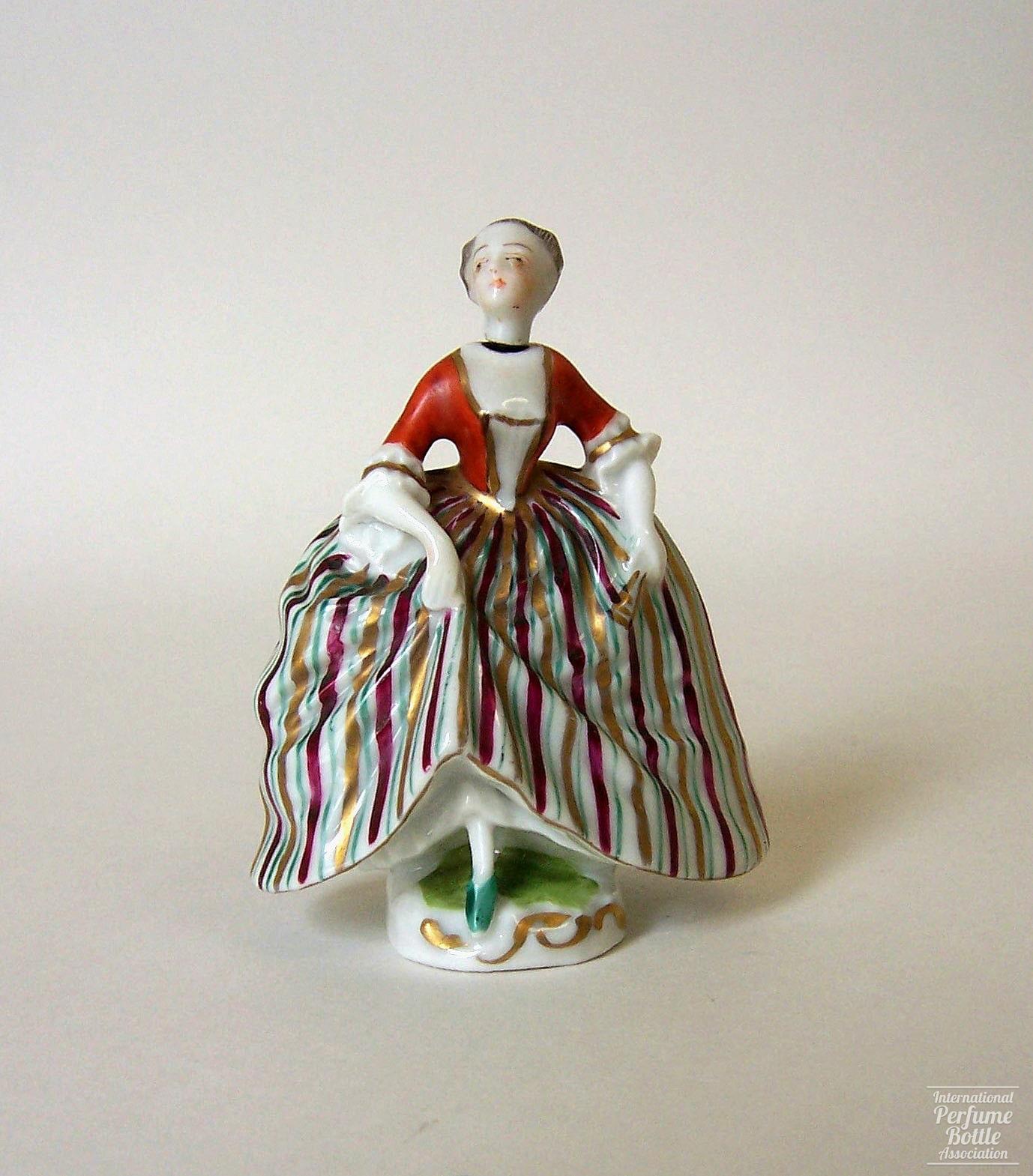 Figural Lady in Striped Skirt by Sitzendorf