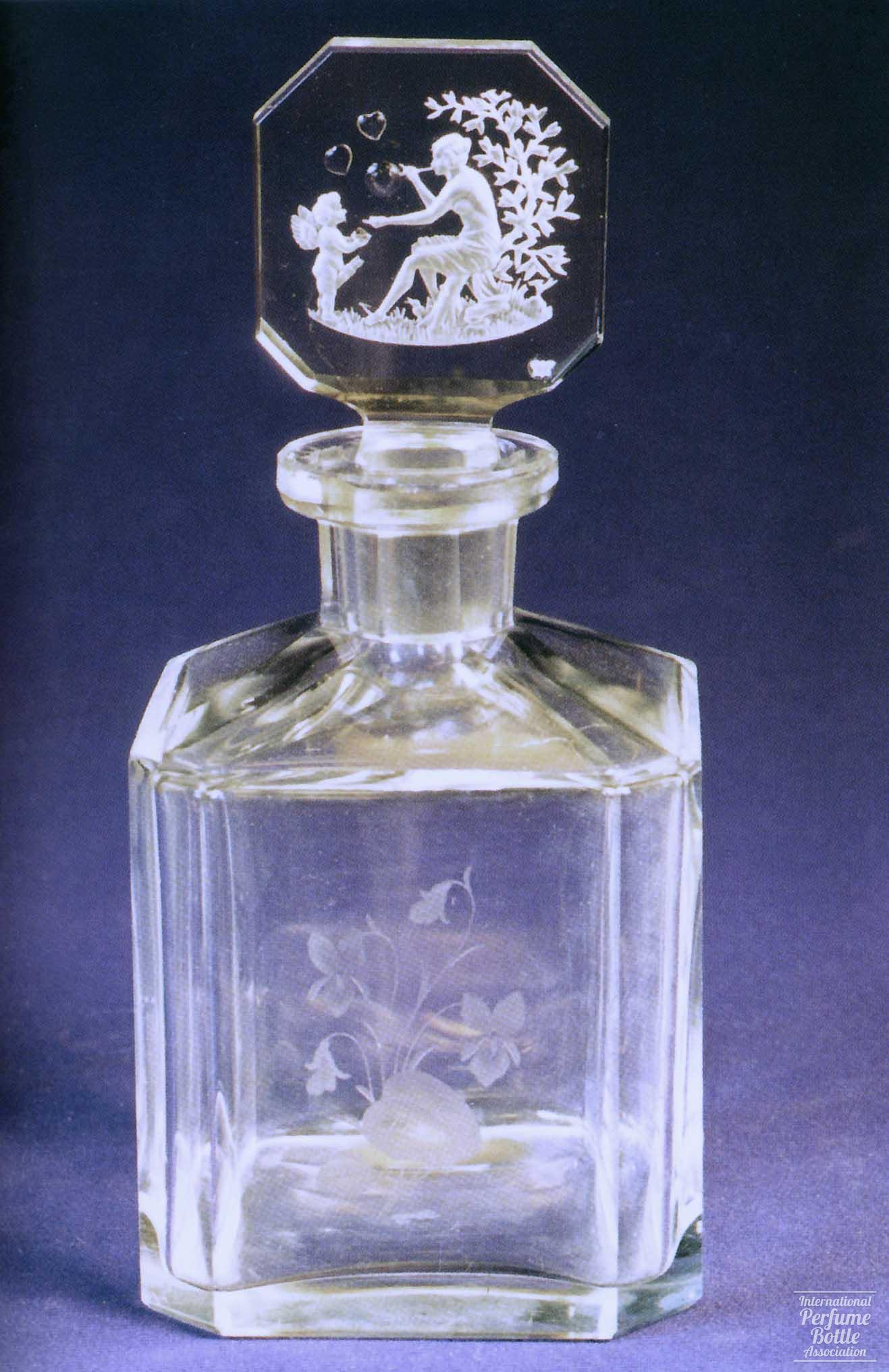 Clear Bottle With Cupid and Venus Blowing Bubbles by Hoffmann