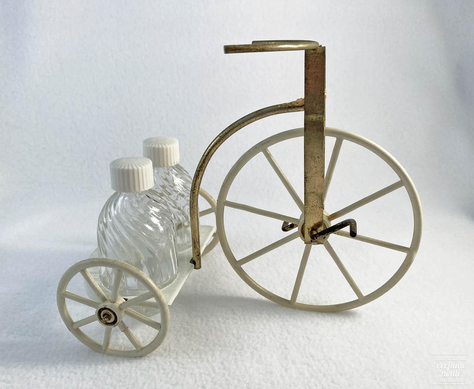 Metal Tricycle With Two Mini Perfumes, Rubicon Distr. Co.