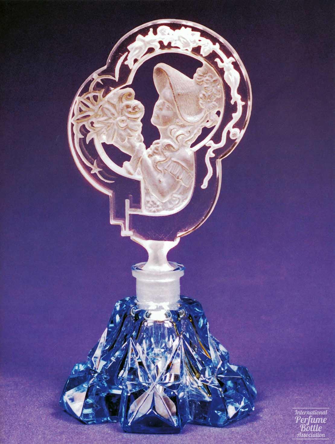 Blue Bottle With Maiden in Flowered Bonnet