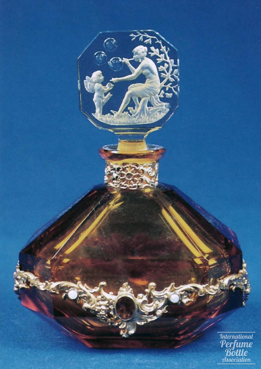 Amber Bottle With Cupid and Venus Blowing Bubbles by Hoffmann