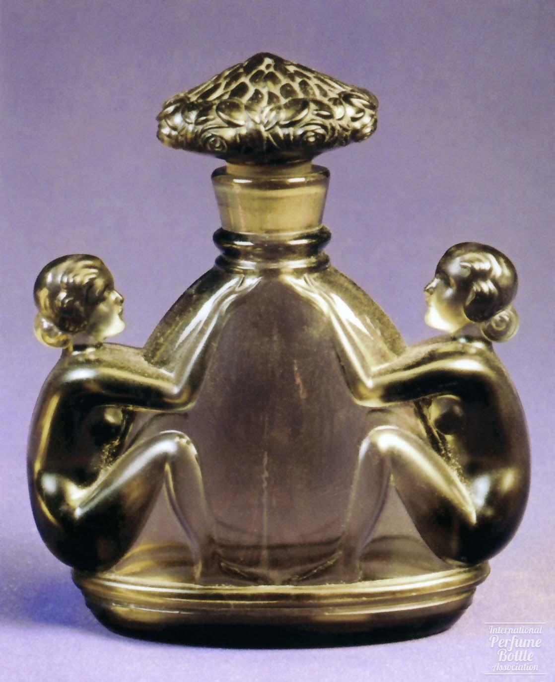 Czech Perfume Held by Two Nudes