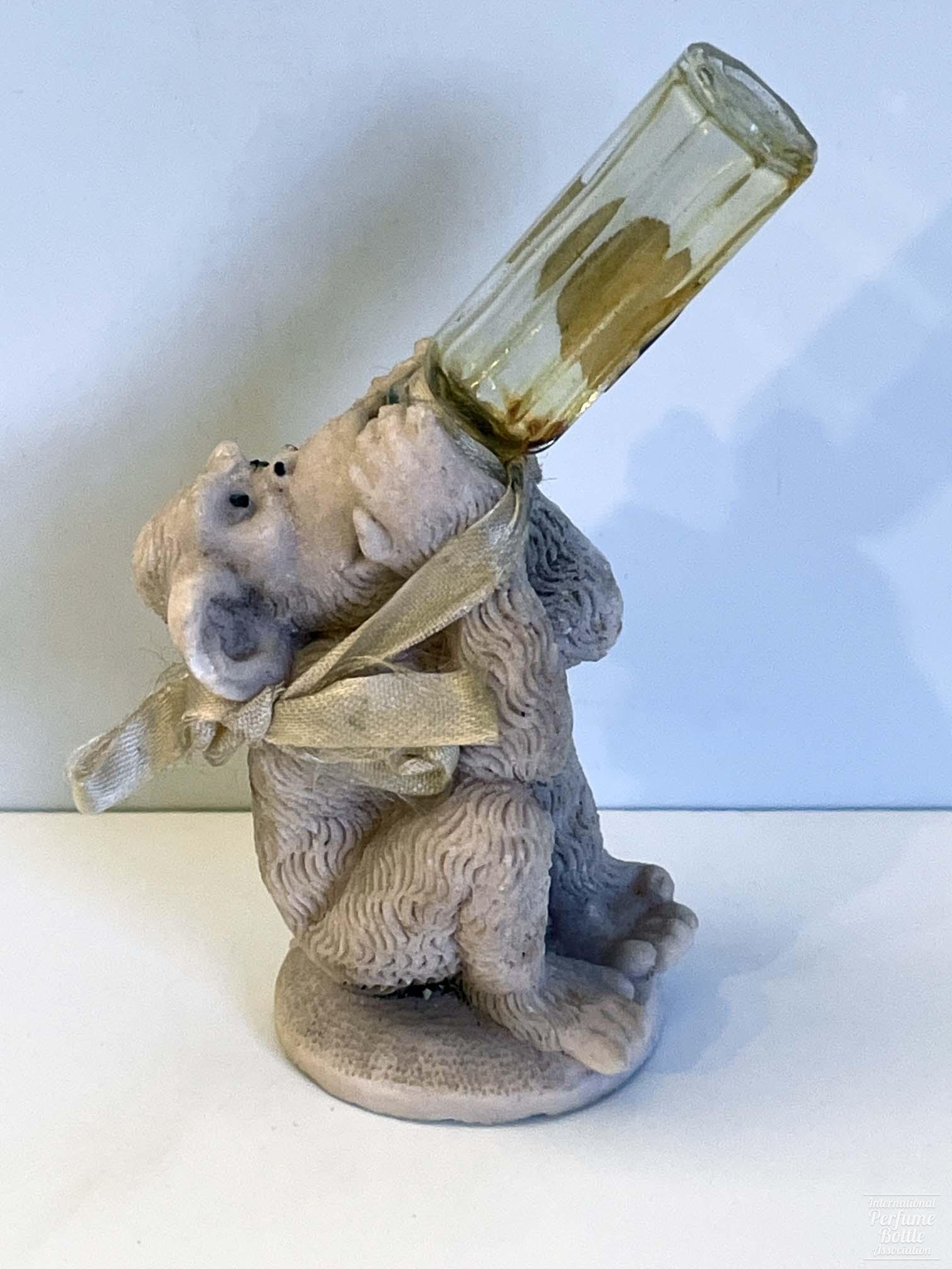 Monkey Drinking From Bottle