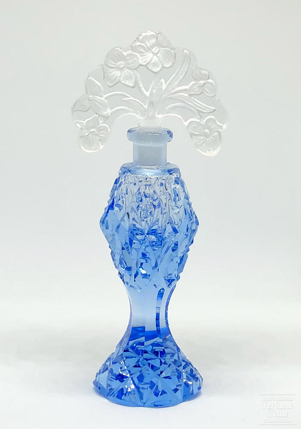 Blue Bottle With Floral Stopper