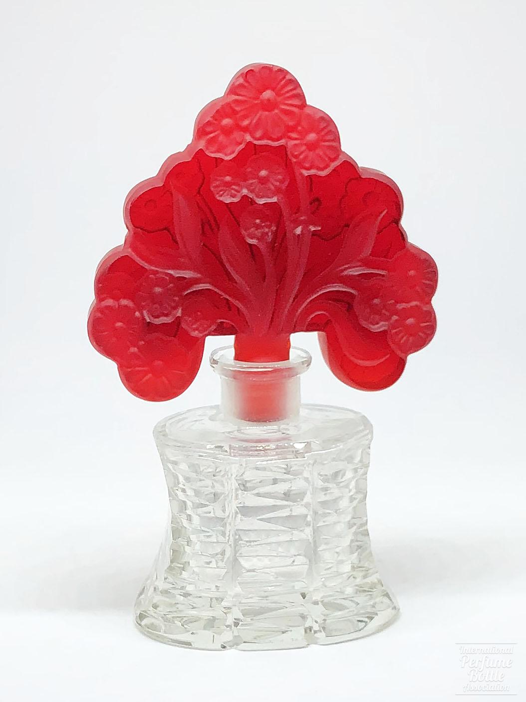 Clear Bottle With Red Floral Stopper